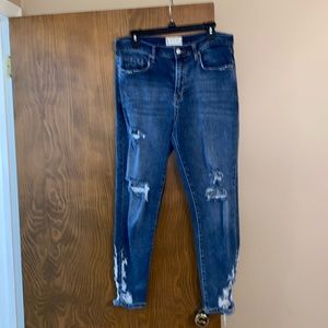 We the free size 31 heavily distressed jeans